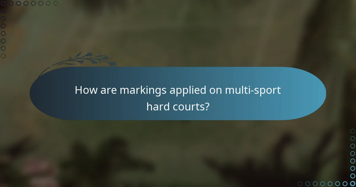 How are markings applied on multi-sport hard courts?